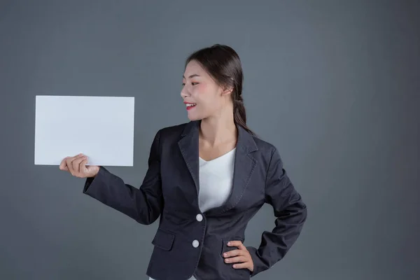 Office Girl Holding White Blank Board Gray Background — 图库照片