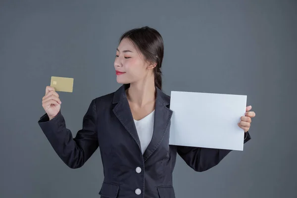 Office Girl Holds White Blank Board Holds Smart Card Gray — 图库照片