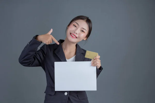 Office Girl Holds White Blank Board Holds Smart Card Gray — 图库照片