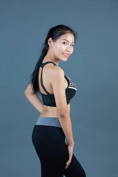 Women Sportswear Gray Background — Fotografia de Stock