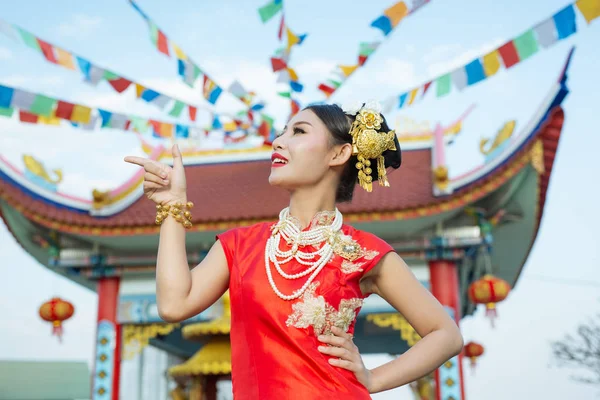 Beautiful Asian Girl Wearing Red Suit Showing Her Gestures Smiling — Stockfoto