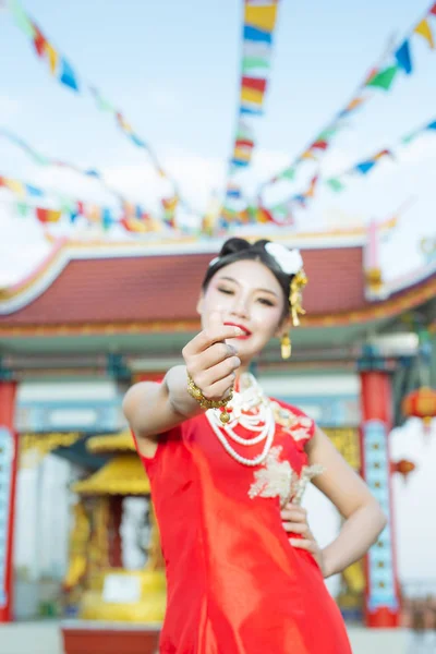 Beautiful Asian Girl Wearing Red Suit Showing Her Gestures Smiling — Stockfoto