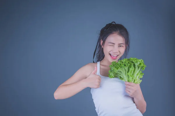 Girl Holds Vegetables Gray Background — 图库照片
