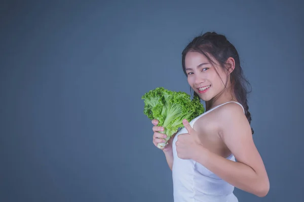 Girl Holds Vegetables Gray Background — Foto de Stock