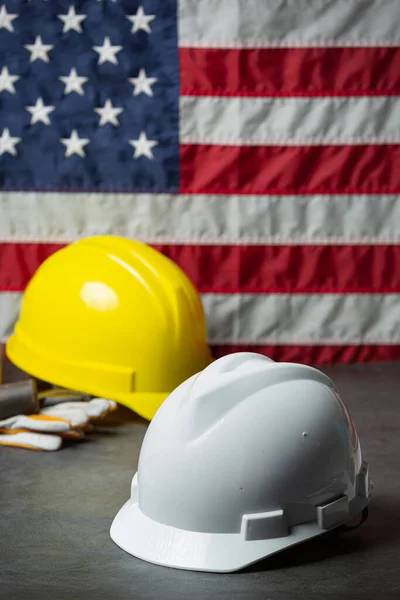 American flag and tools near the helmet Labor day concept.