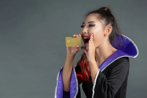 Woman Witch Costume Holding Credit Card Dark Background — Fotografia de Stock