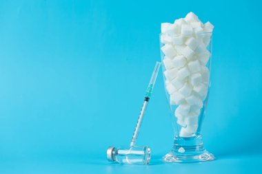 Dünya Diyabet Günü, metin dünyası Diyabet Günü ve mavi halkalı bir adam.