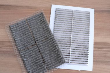 Large dust on the ventilation grate and on the filter clipart