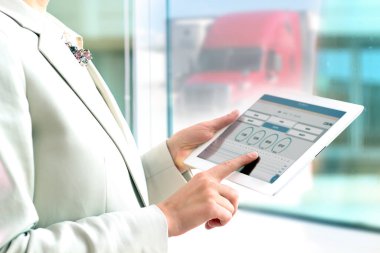 Safety manager shows logbook on a tablet
