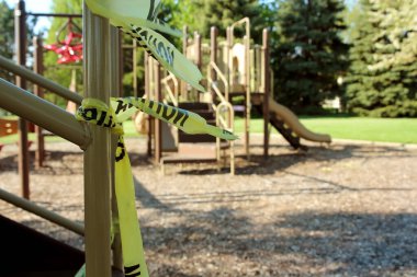 empty children playground  swing during the coronavirus quarantine