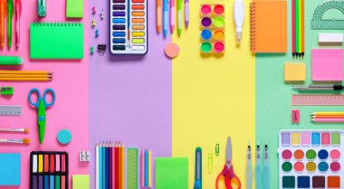 School Supplies In Frame With Colorful Paper Background clipart