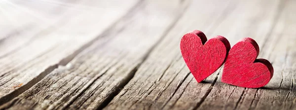 Two Wooden Hearts Rustic Table Sunlight — Stock Photo, Image