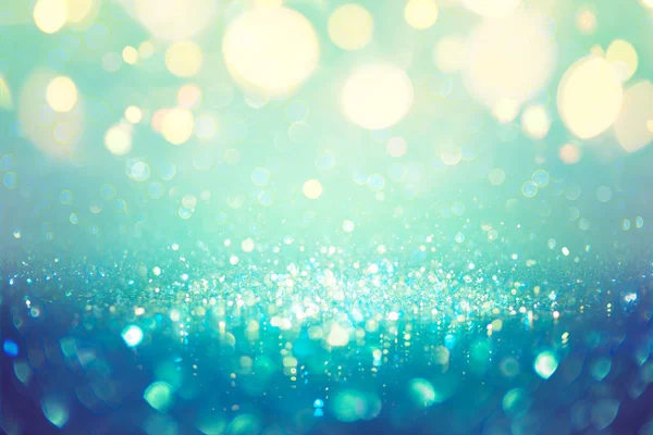 Christmas Defocused Teal Green Blue Dust Bokeh Lights — Stock Photo, Image