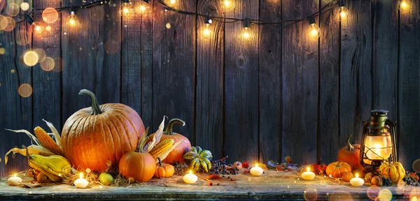 Thanksgiving Pumpkins Rustic Table Candles String Lights — Stock Photo, Image