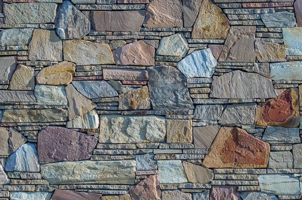        yan ışık ile sabahın erken saatlerinde düz taş duvar                        