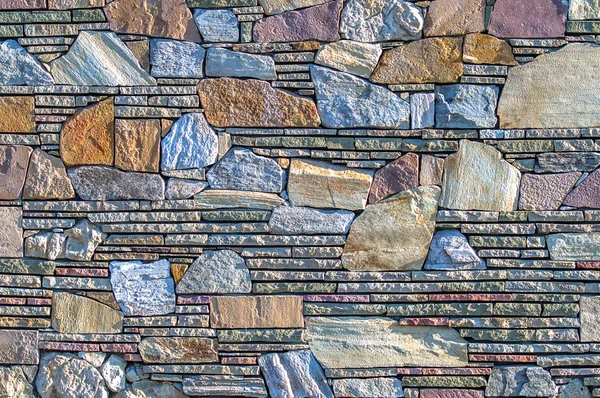        yan ışık ile sabahın erken saatlerinde düz taş duvar                        