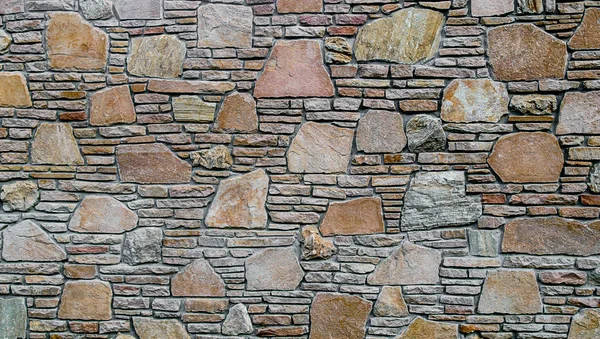        yan ışık ile sabahın erken saatlerinde düz taş duvar                        