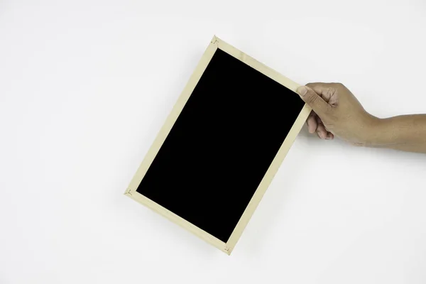 Beyaz Arka Plan Üzerinde Siyah Tahta Tutan — Stok fotoğraf