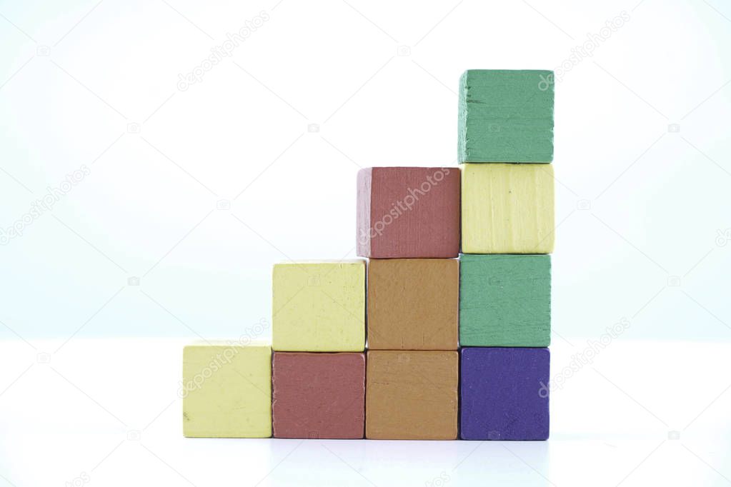colorful Wooden cube blocks on white background