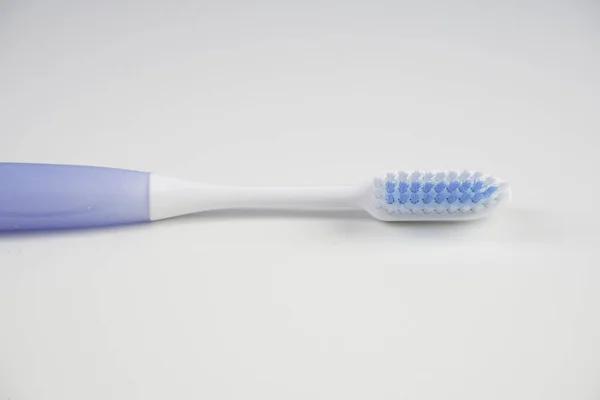 Een Tandenborstel Met Borstel Geïsoleerd Studio — Stockfoto