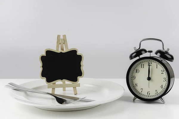 old-fashioned Alarm clock in studio, time concept