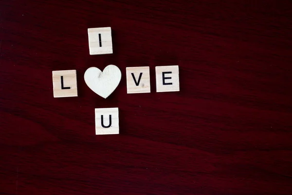 wooden cubes with letters, i love you