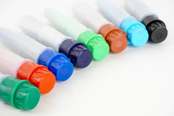 felt tip pens isolated on white in studio, colorful paint pens