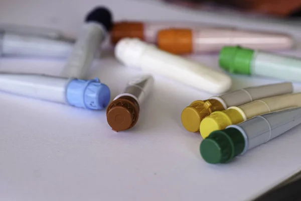 different tools and pills on a white background