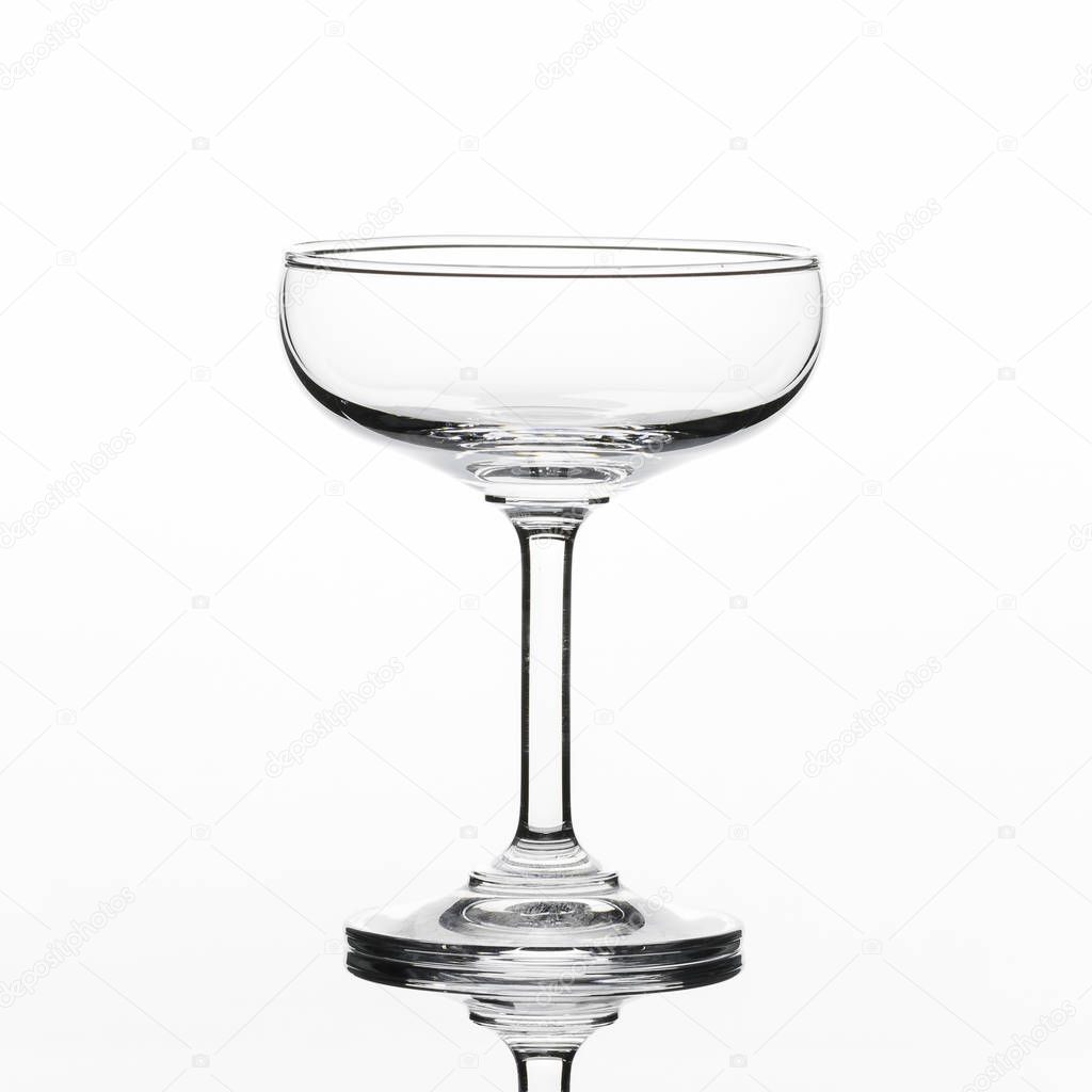 clear empty glass isolated on white background in studio 