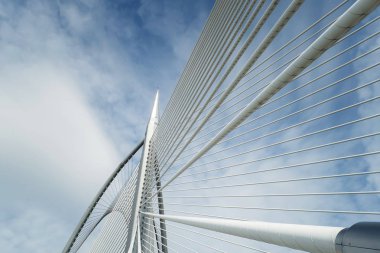 modern bridge construction against blue sky