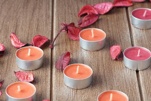 paraffin Tealight Candles and dry petals