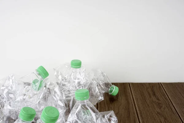 plastic bottles on wooden floor, recycling