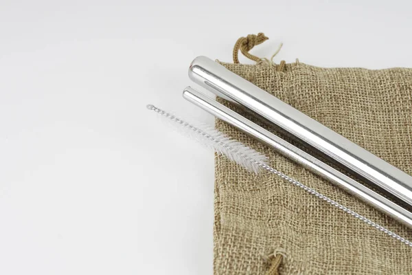 stainless steel tube straw on burlap bag