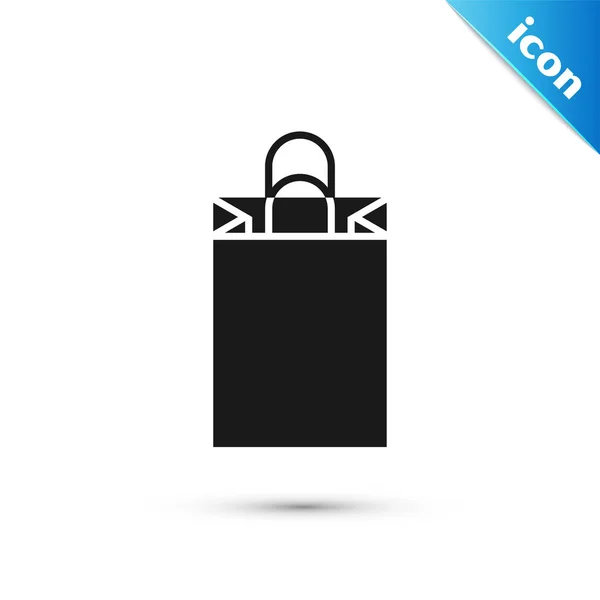 Icona della shopping bag in carta nera isolata su sfondo bianco. Un cartello. Illustrazione vettoriale — Vettoriale Stock