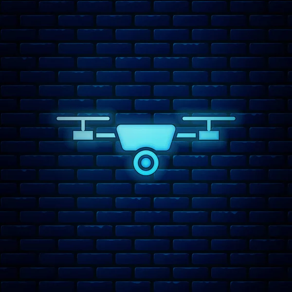 Drone de néon brilhante voando com ícone de câmera de vídeo de ação isolado no fundo da parede de tijolo. Quadrocopter com símbolo de câmera de vídeo e foto. Ilustração vetorial —  Vetores de Stock