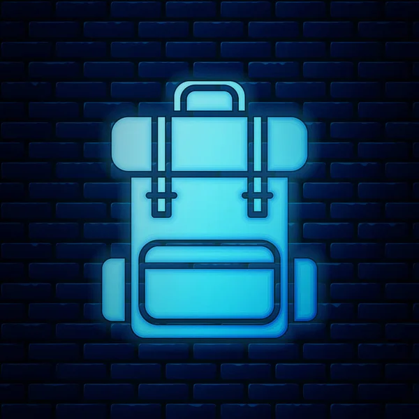 Gloeiende neon Wandelen rugzak pictogram geïsoleerd op baksteen muur achtergrond. Kamperen en bergen verkennen rugzak. Vector Illustratie — Stockvector