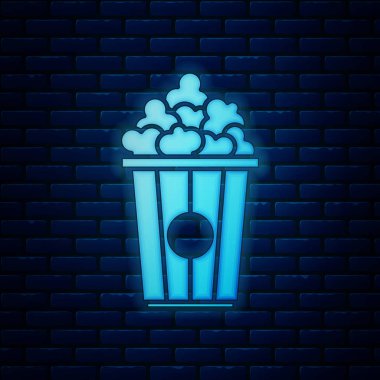 Tuğla duvar arka planda izole karton kutu simgesi parlayan Neon Popcorn. Patlamış mısır kutusu. Vektör Illustration
