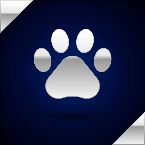 Silver Paw print icon isolated on dark blue background. Dog or cat paw print. Animal track. Vector Illustration