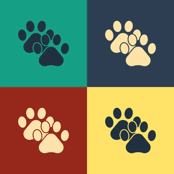 Color Paw print icon isolated on color background. Dog or cat paw print. Animal track. Vintage style drawing. Vector Illustration — Stock Vector