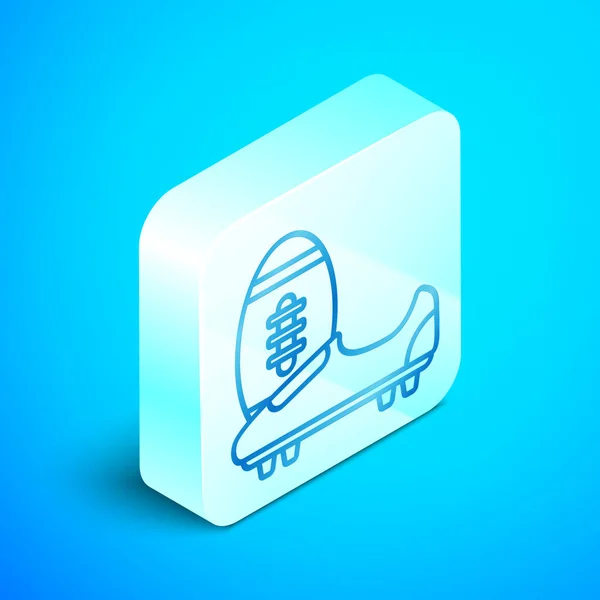 Línea isométrica Zapatillas de fútbol o de fútbol con pinchos icono aislado sobre fondo azul. Bota y pelota de fútbol americano. Botón cuadrado plateado. Ilustración vectorial — Archivo Imágenes Vectoriales