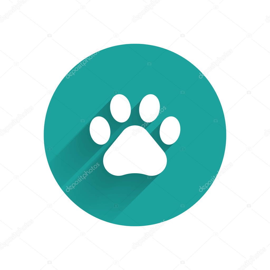 White Paw print icon isolated with long shadow. Dog or cat paw print. Animal track. Green circle button. Vector Illustration