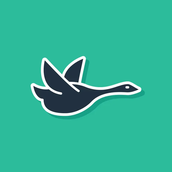 Blaue fliegende Ente Symbol isoliert auf grünem Hintergrund. Vektorillustration — Stockvektor