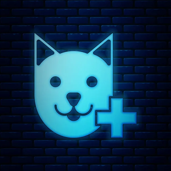 Glödande Neon veterinärklinik symbolikon isolerad på tegelvägg bakgrund. Korsa med katt veterinary bekymmer. PET första hjälpen tecken. Vektor illustration — Stock vektor
