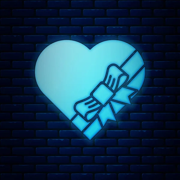 Doce de néon brilhante na caixa em forma de coração e ícone de arco isolado no fundo da parede de tijolo. Dia dos Namorados. Ilustração vetorial —  Vetores de Stock