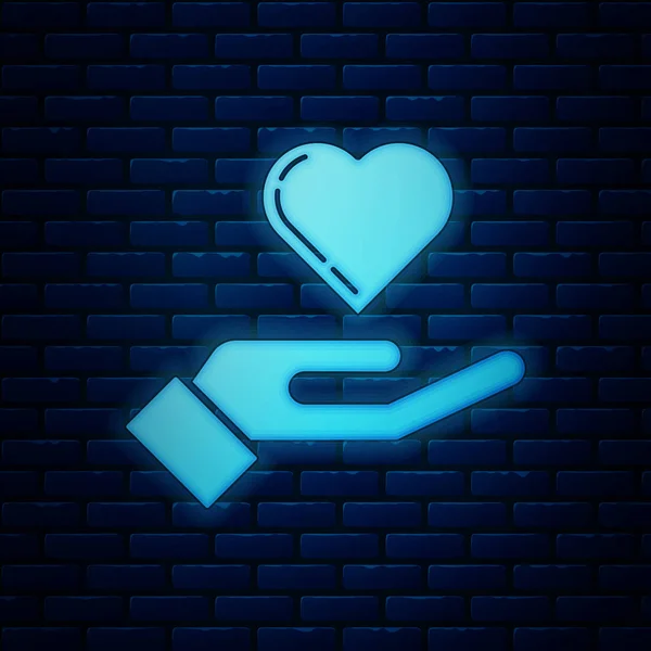 Glowing neon Heart on hand icon isolated on brick wall background. Hand giving love symbol. Vector Illustration — Stock Vector