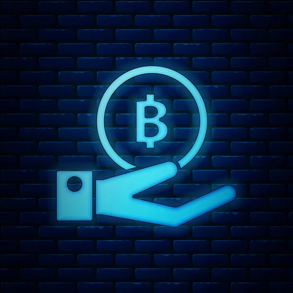 Glödande Neon hand innehav Bitcoin ikon isolerad på tegelvägg bakgrund. Blockchain-teknik, digitala penningmarknaden, cryptocoin plånbok. Vektor illustration — Stock vektor