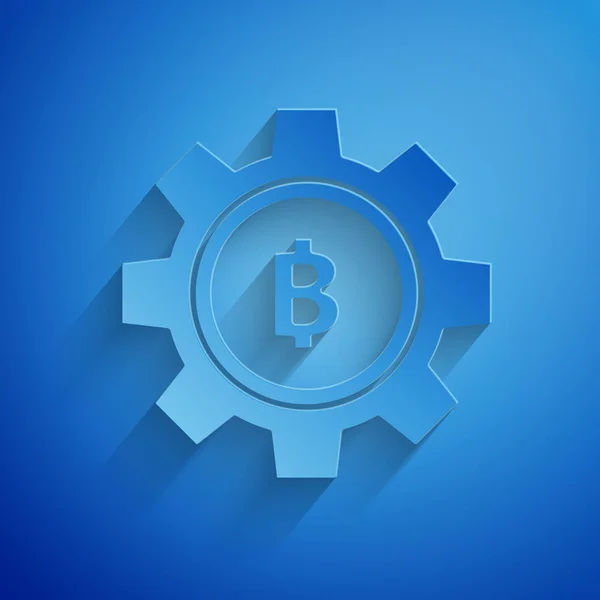 Papier knippen Cryptogeld Coin Bitcoin pictogram geïsoleerd op blauwe achtergrond. Gear en Bitcoin-instelling. Blockchain gebaseerde Secure crypto-valuta. Papier kunststijl. Vector illustratie — Stockvector