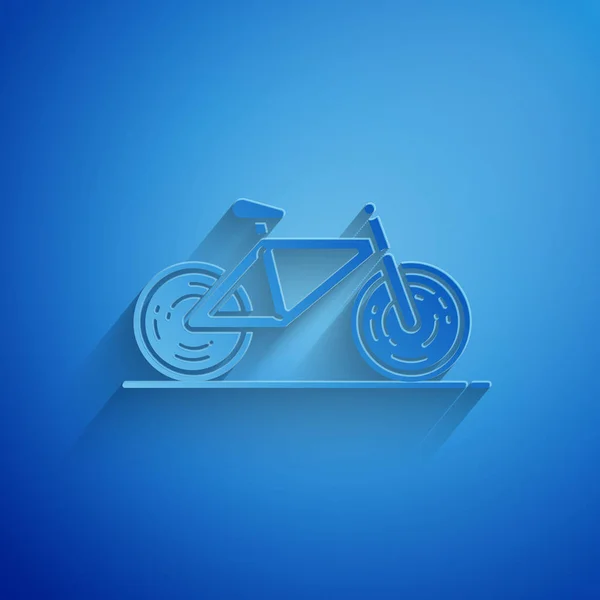 Corte de papel Icono de bicicleta aislado sobre fondo azul. Carrera de bicicletas. Deporte extremo. Equipamiento deportivo. Estilo de arte de papel. Ilustración vectorial — Archivo Imágenes Vectoriales