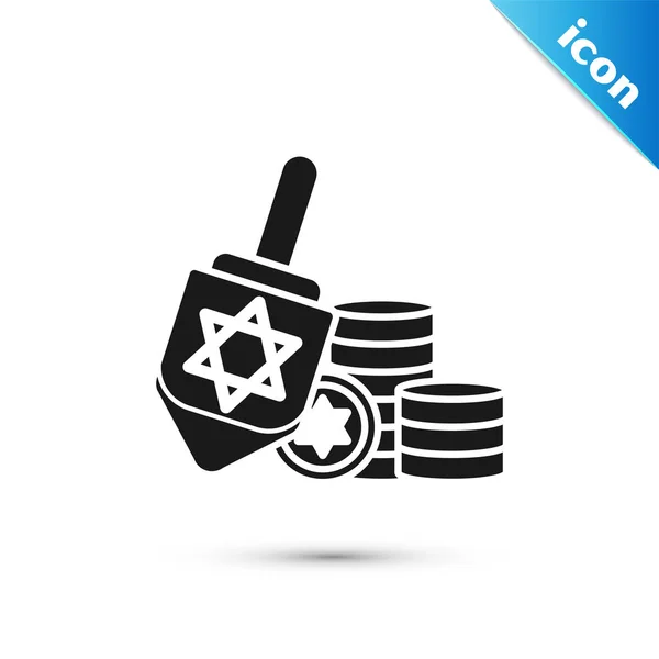 Черная Hanukkah dreidel и иконка монеты изолированы на белом фоне. Векторная миграция — стоковый вектор