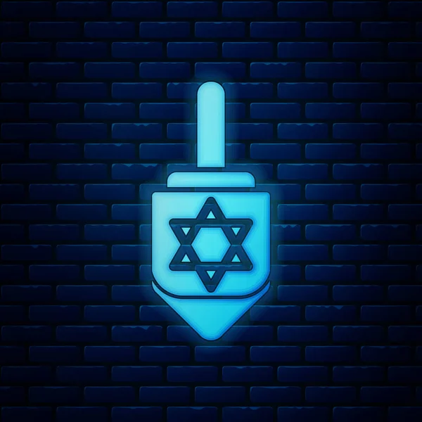 Lumineux néon Hanoukka dreidel icône isolée sur fond de mur de briques. Illustration vectorielle — Image vectorielle